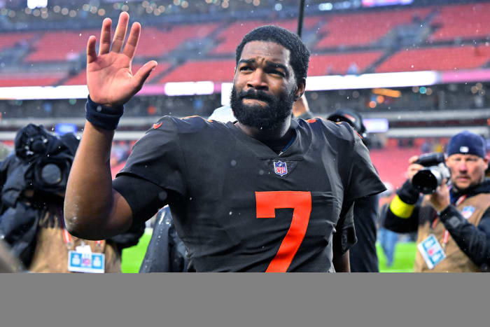 Jacoby Brissett waves to the crowd as he leaves the field after a victory over the Bucs